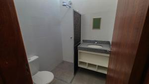 Bilik mandi di Aconchego Flats em Olímpia +6 gambar