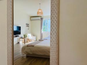 Llit o llits en una habitació de W24 Kenting Hostel II