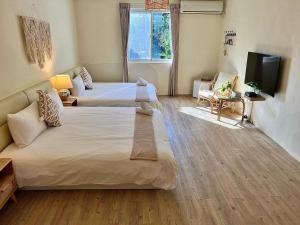 Llit o llits en una habitació de W24 Kenting Hostel II