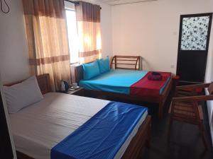 Letto o letti in una camera di Absolute Breeze by cherins