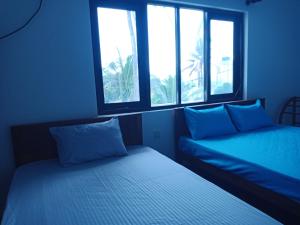 Letto o letti in una camera di Absolute Breeze by cherins