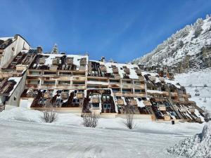 a large building in the snow on a mountain at Avoriaz : Apt 2 chambres, 6 pers, balcon, WIFI - FR-1-314-259 in Morzine
