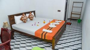Postel nebo postele na pokoji v ubytování Prem Nadee Homestay