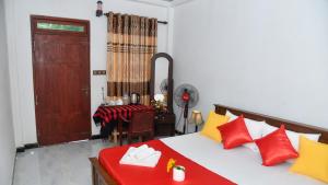 Postel nebo postele na pokoji v ubytování Prem Nadee Homestay