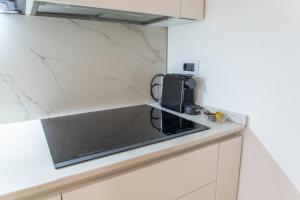 Cucina o angolo cottura di !Subway to Duomo! Modern loft with AC and free wifi