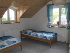 Rúm í herbergi á Apartment Sendraž