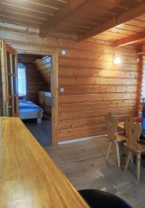 Posteľ alebo postele v izbe v ubytovaní Apartamenty Sosna