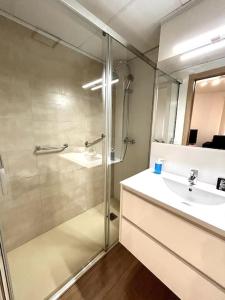 a bathroom with a shower and a sink at La Merced - Más que apartamentos in Murcia