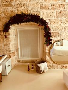 Fotografie z fotogalerie ubytování Hydria Guest House Art Gallery Dimora d artista con terrazza e vasca idromassaggio nel cuore del borgo antico Artists Home with terrace and jacuzzi in the heart of the old town v destinaci Acquaviva delle Fonti