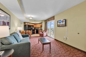 a living room with a couch and a table at City View Unit in the heart of Myrtle in Myrtle Beach