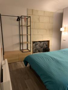 Postel nebo postele na pokoji v ubytování L'étape de Marcel - Pagnol - 1er étage