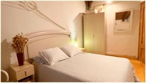 A bed or beds in a room at Casa Rural Xixa Landetxea