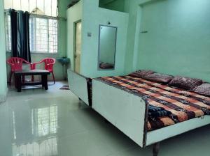 Hotel HillView, Junagadh客房内的一张或多张床位