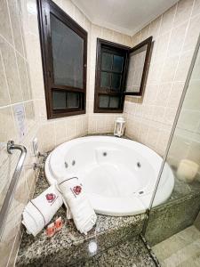 Um banheiro em Hotel Recanto da Serra