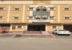 a building with a car parked in front of it at فندق لجين الغربية in Jeddah