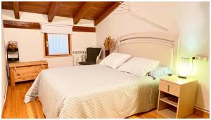 A bed or beds in a room at Casa Rural Xixa Landetxea