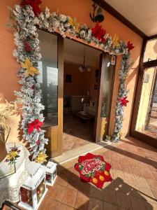 a room with a doorway with a christmas decoration at B&B Il Girasole in Castel di Sangro