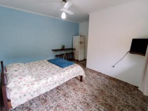 Postel nebo postele na pokoji v ubytování Diva Surf Quartos