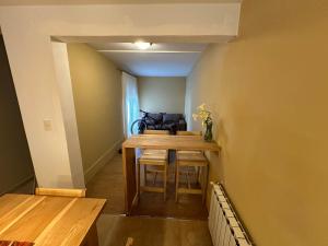 a small dining room with a table and chairs at Casa Monte Hermoso Del Este in Monte Hermoso +3 photos