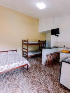 Postel nebo postele na pokoji v ubytování Diva Surf Quartos