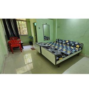 Hotel HillView, Junagadh客房内的一张或多张床位