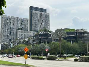 a view of a city with tall buildings at Edusphere Suites, University of Cyberjaya near Tamarind Square in Cyberjaya