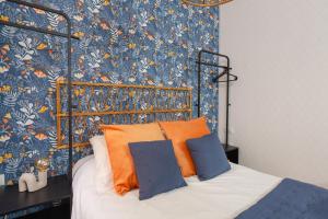 A bed or beds in a room at Casa Armonía