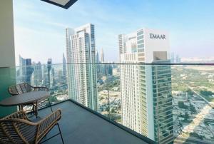 a balcony with a view of a city at 2BR,Direct to Dubai mall, Burj Khalifa52 in Dubai