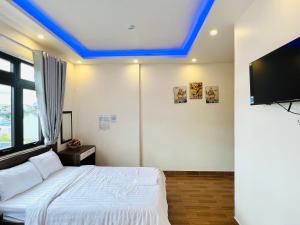 TV a/nebo společenská místnost v ubytování Hotel Duy Dũng - Đà Lạt