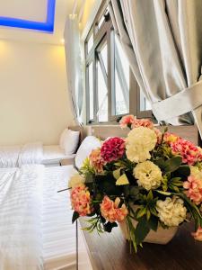 Letto o letti in una camera di Hotel Duy Dũng - Đà Lạt
