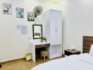 Letto o letti in una camera di Hotel Duy Dũng - Đà Lạt