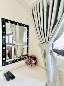 Letto o letti in una camera di Hotel Duy Dũng - Đà Lạt