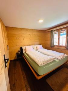 Voodi või voodid majutusasutuse Chalet Solaria 2 bedrooms with mountain and garden view toas
