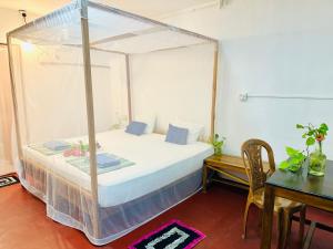 Postel nebo postele na pokoji v ubytování Beach Cab Resort