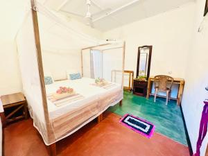 Postel nebo postele na pokoji v ubytování Beach Cab Resort