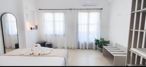 Postel nebo postele na pokoji v ubytování Sunrise