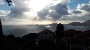 a view of the ocean under a cloudy sky at DEMIVIE GUESTHOUSE in Lerici