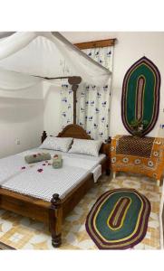 Postelja oz. postelje v sobi nastanitve Kipekee house, Zanzibar