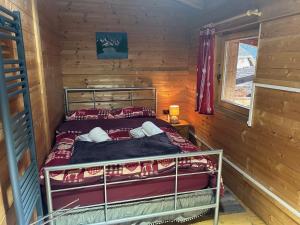 Posteľ alebo postele v izbe v ubytovaní Gasthof Rafting Alm