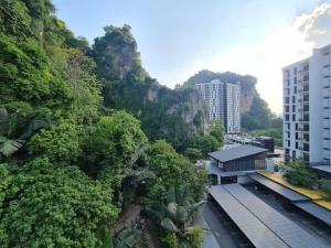 a view of a train station with trees and buildings at IPOH TAMBUN THE Cove your ultimate relaxing Getaway666 in Ipoh