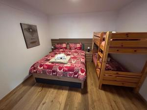 Posteľ alebo postele v izbe v ubytovaní Gasthof Rafting Alm
