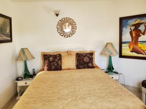 Tempat tidur dalam kamar di Sandcastles Resort, Ocho Rios