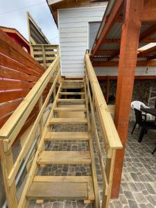 a set of stairs leading up to a house at Casa Caleta Vieja Pichidangui in Los Vilos