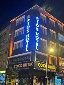 a building with a sign that reads coco burrito at Rio's Hotel AİRPORT in Istanbul
