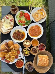 a group of plates of food on a table at DOA Sapanca Tiny House in Sakarya