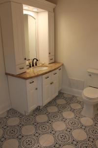 a bathroom with a sink and a toilet at 4 Guest Suite with Waterfront Views at Fancie's PEC - Suite 2 in Belleville +6 photos