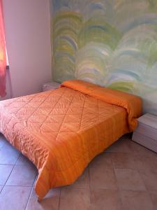 Postel nebo postele na pokoji v ubytování Albergo La Grolla