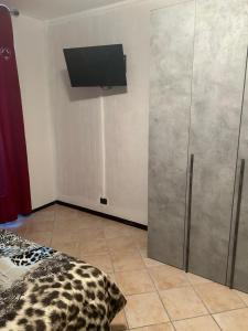 TV a/nebo společenská místnost v ubytování Albergo La Grolla