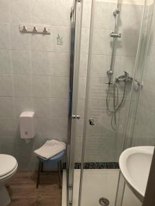 Koupelna v ubytování Albergo La Grolla + 37 fotografií