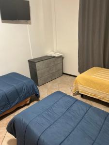 Postel nebo postele na pokoji v ubytování Albergo La Grolla